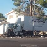 Semi-truck crushes vehicle in deadly Las Vegas crash; driver arrested on DUI-related charges
