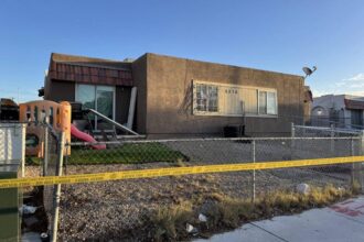 Police investigate homicide after body found in burning home in northwest Las Vegas
