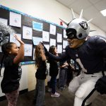 Las Vegas Raiders celebrate with students at Spirit Day event