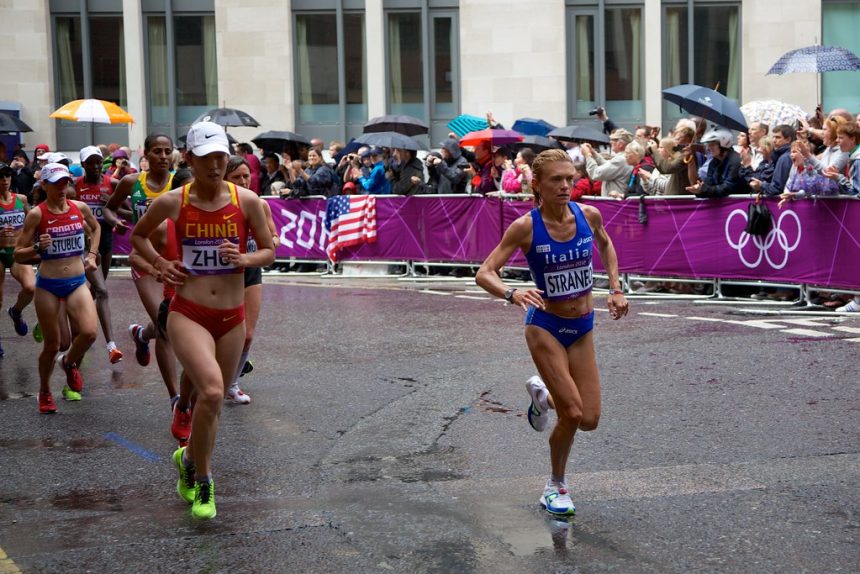 COMMENTARY: Olympics tank in China, thrive in Italy