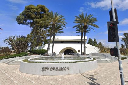 He says Carson councilwoman asked him to mow her lawn and spy on colleague. City disputes his lawsuit