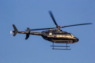 Video from Las Vegas police helicopter shows motorist tackling suspect after crash