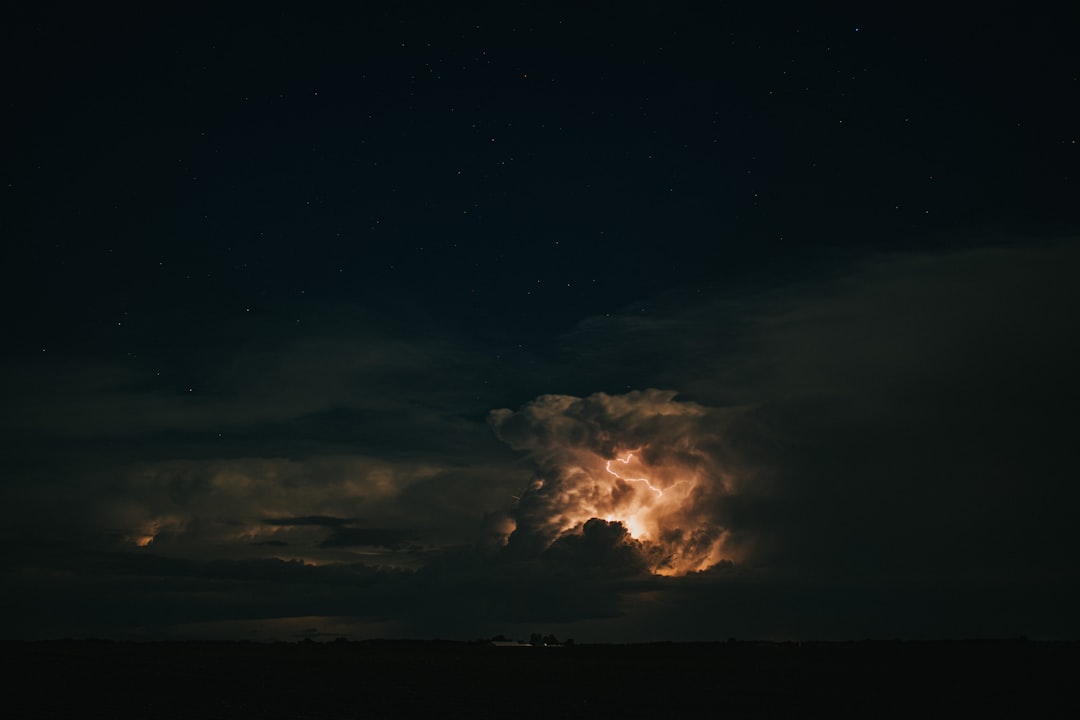 Lightning, funnel cloud captured above Valley sky
