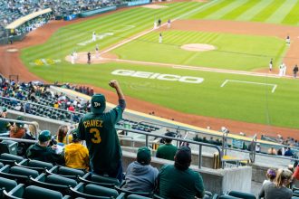 Athletics beat Rangers, sit atop AL West for 1st time since 2021