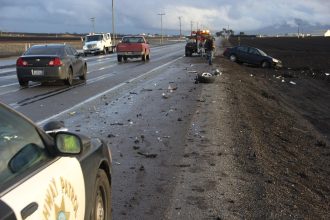 Police: Driver repairing car on side of road hit by suspected DUI driver in Las Vegas