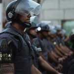 Suspect barricades in apartment after officer-involved shooting