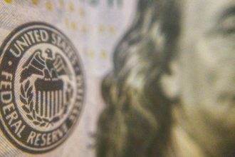 Federal Reserve keeps key rate unchanged even as 4 officials dissent