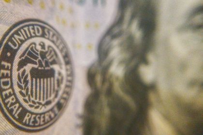 Federal Reserve keeps key rate unchanged even as 4 officials dissent