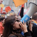 Yvette Benarroch says Angie Nixon’s bullhorn protest left her with possible ear damage, files workers’ comp claim