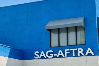 SAG-AFTRA reaches tentative labor deal with major studios