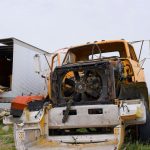 Driver pinned after semi-truck overturns in central Las Vegas