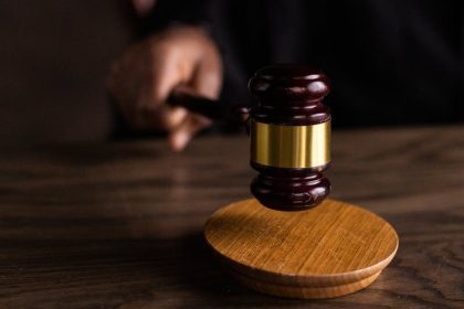Husband accused of killing pregnant wife cut off ankle monitor and flew to Italy seeking asylum