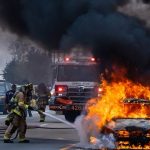 110 freeway closed in both directions in Wilmington for fire near encampment