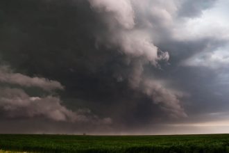 The sheer scale of this supercell storm over a country road