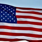 Why US flags are flying at half-staff on Friday, and the proper way to lower yours
