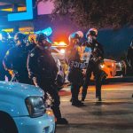 Suspect accused of shooting Fresno police officer hospitalized with self-inflicted gunshot wound