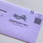 Clark County begins processing mail-in ballots; some require signature curing
