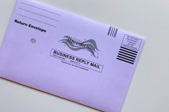 Clark County begins processing mail-in ballots; some require signature curing